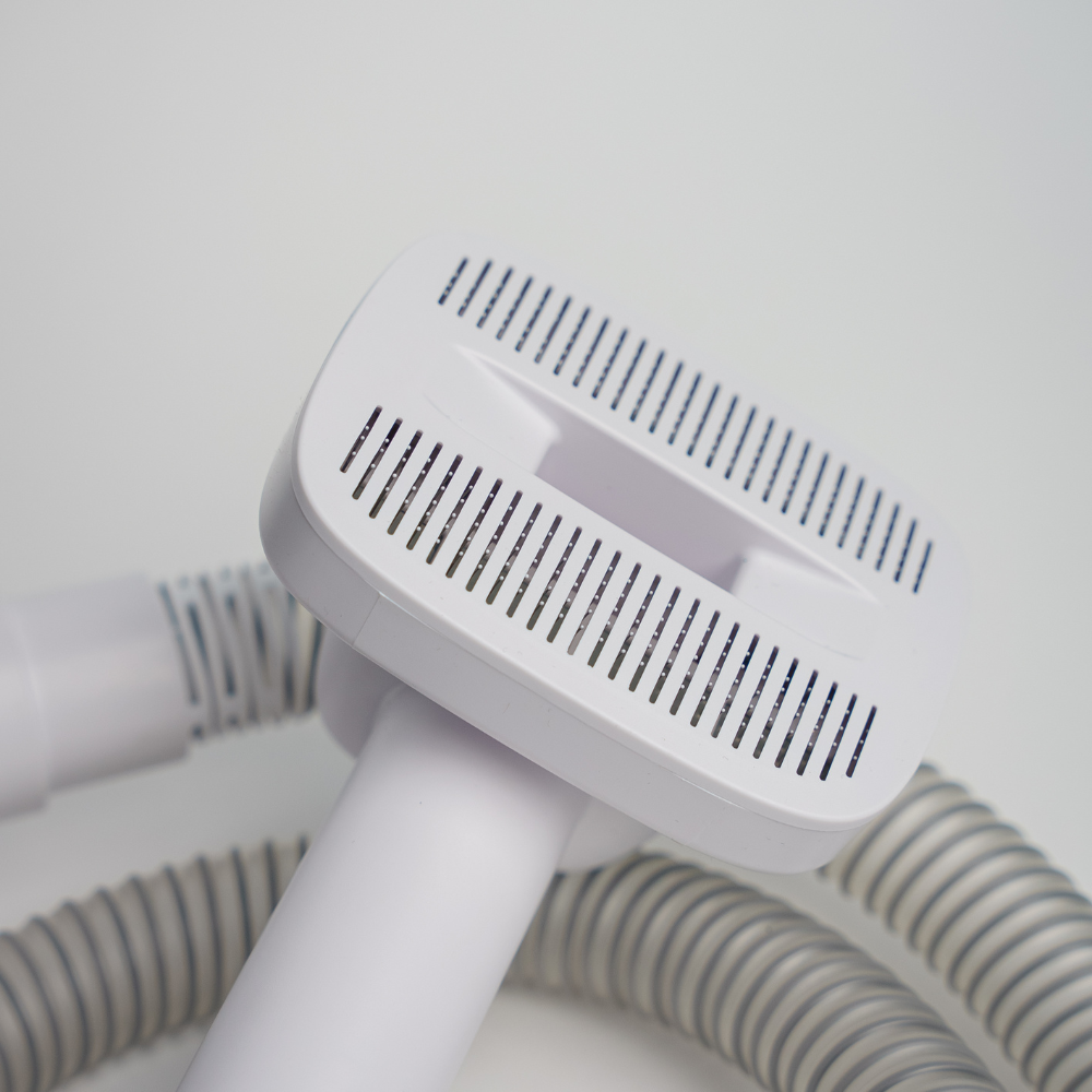 Fluffycare 6-i-1 Pelsplejesæt med Støvsuger